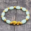 Golden Pixiu Wealth Bracelet with Red Agate Golden Pixiu Wealth Bracelet with Red Agate
