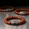Tibetan Yak Bone Nine-Eye Dzi Bead Bracelet Tibetan Yak Bone Nine-Eye Dzi Bead Bracelet