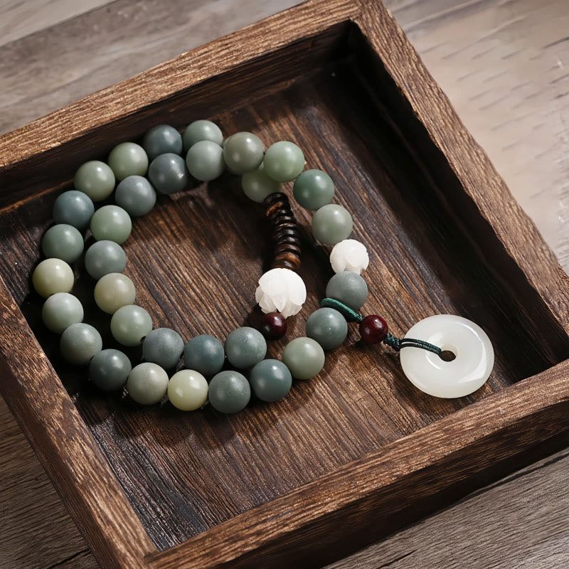 Cyan Bodhi Seed Lotus Jade Bracelet Cyan Bodhi Seed Lotus Jade Bracelet