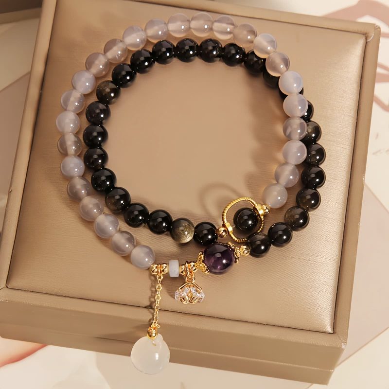 Gold Sheen Obsidian Lotus Charm Bracelet Gold Sheen Obsidian Lotus Charm Bracelet