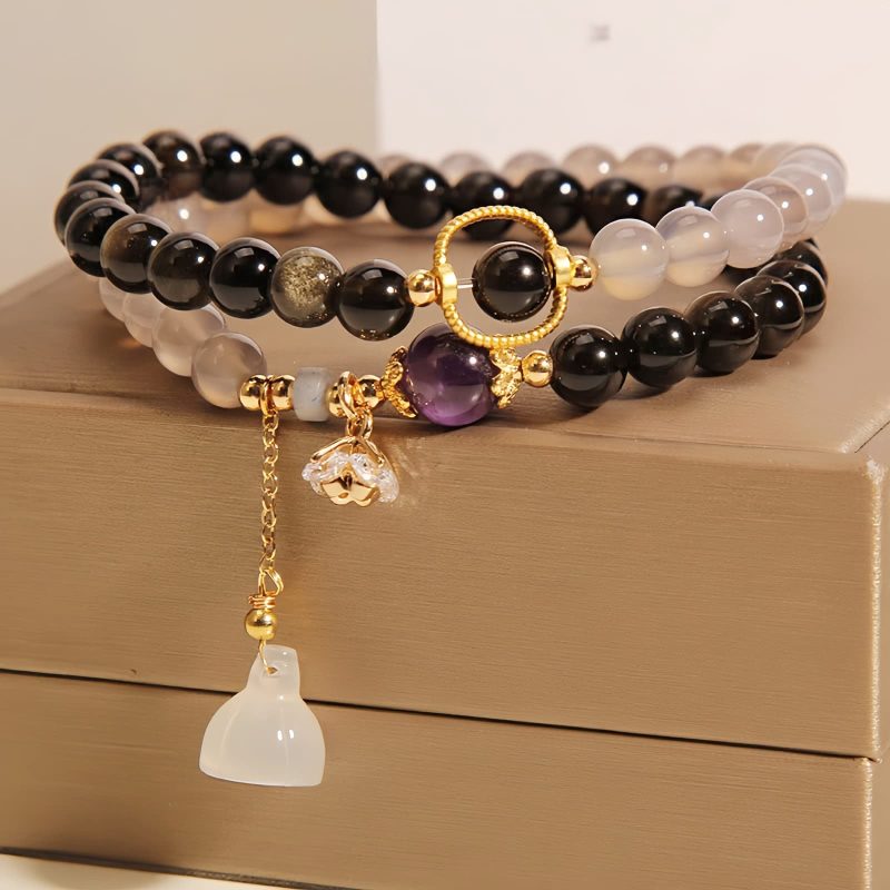 Gold Sheen Obsidian Lotus Charm Bracelet Gold Sheen Obsidian Lotus Charm Bracelet