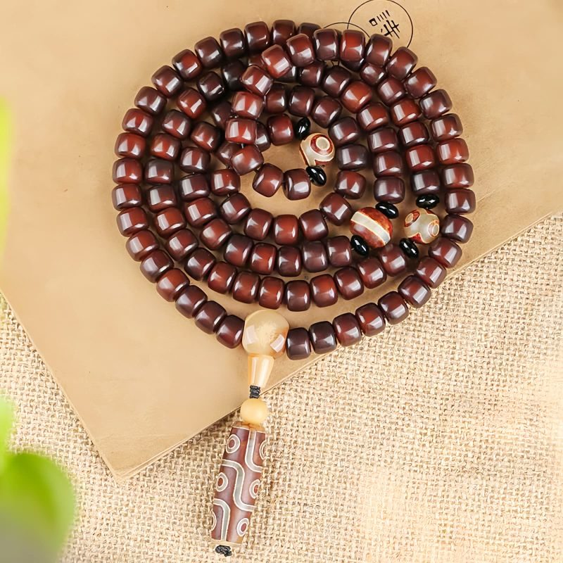 Three-Eyed Dzi Bead & Jade Luck Bracelet Three-Eyed Dzi Bead & Jade Luck Bracelet