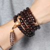 Three-Eyed Dzi Bead & Jade Luck Bracelet Three-Eyed Dzi Bead & Jade Luck Bracelet