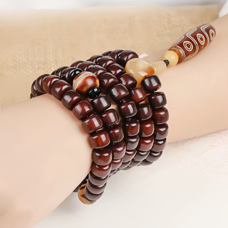 Three-Eyed Dzi Bead & Jade Luck Bracelet Three-Eyed Dzi Bead & Jade Luck Bracelet