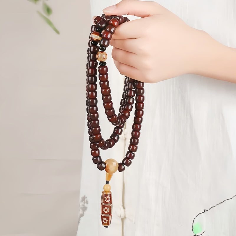 Three-Eyed Dzi Bead & Jade Luck Bracelet Three-Eyed Dzi Bead & Jade Luck Bracelet