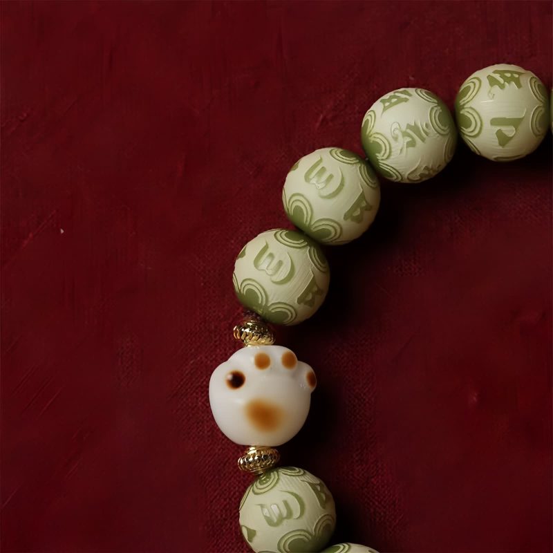 Bodhi Seed Cat Paw Wisdom Bracelet with Om Mani Padme Hum Charm Bodhi Seed Cat Paw Wisdom Bracelet with Om Mani Padme Hum Charm