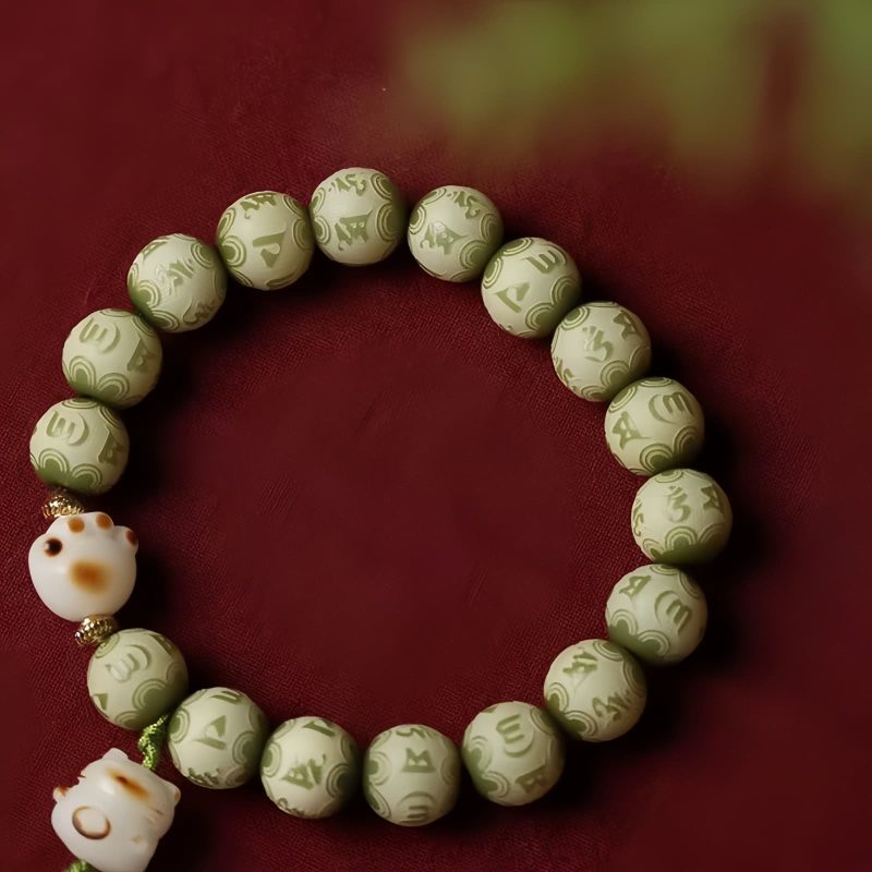 Bodhi Seed Cat Paw Wisdom Bracelet with Om Mani Padme Hum Charm Bodhi Seed Cat Paw Wisdom Bracelet with Om Mani Padme Hum Charm