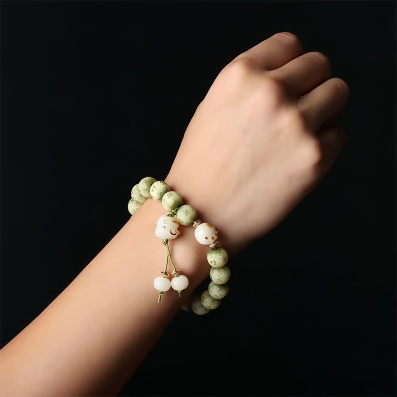Bodhi Seed Cat Paw Wisdom Bracelet with Om Mani Padme Hum Charm Bodhi Seed Cat Paw Wisdom Bracelet with Om Mani Padme Hum Charm