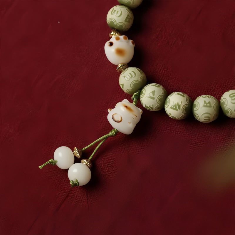 Bodhi Seed Cat Paw Wisdom Bracelet with Om Mani Padme Hum Charm Bodhi Seed Cat Paw Wisdom Bracelet with Om Mani Padme Hum Charm