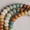 Pulsera de la Paz: Semillas de Bodhi Talladas a Mano Hand-Carved Bodhi Seed Peace Bracelet