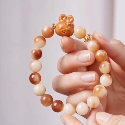 Pulsera de la Paz en Semillas de Bodhi Natural con Motivo de Conejo Pulsera de la Paz en Semillas de Bodhi Natural con Motivo de Conejo
