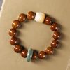 Purple Bodhi Seed Wisdom Bracelet with Dancing Lion Purple Bodhi Seed Wisdom Bracelet with Dancing Lion