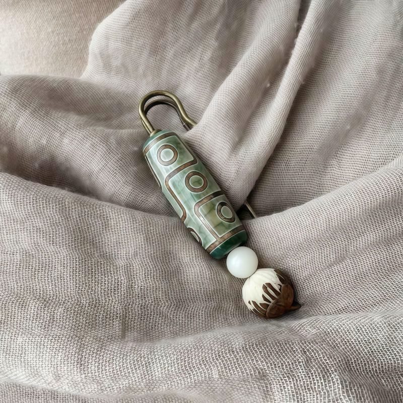 Tibetan Nine-Eye Dzi Bead Bodhi Seed Brooch Tibetan Nine-Eye Dzi Bead Bodhi Seed Brooch