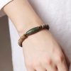 Tibetan Nine-Eye Dzi Bead Sandalwood Peace Bracelet Tibetan Nine-Eye Dzi Bead Sandalwood Peace Bracelet