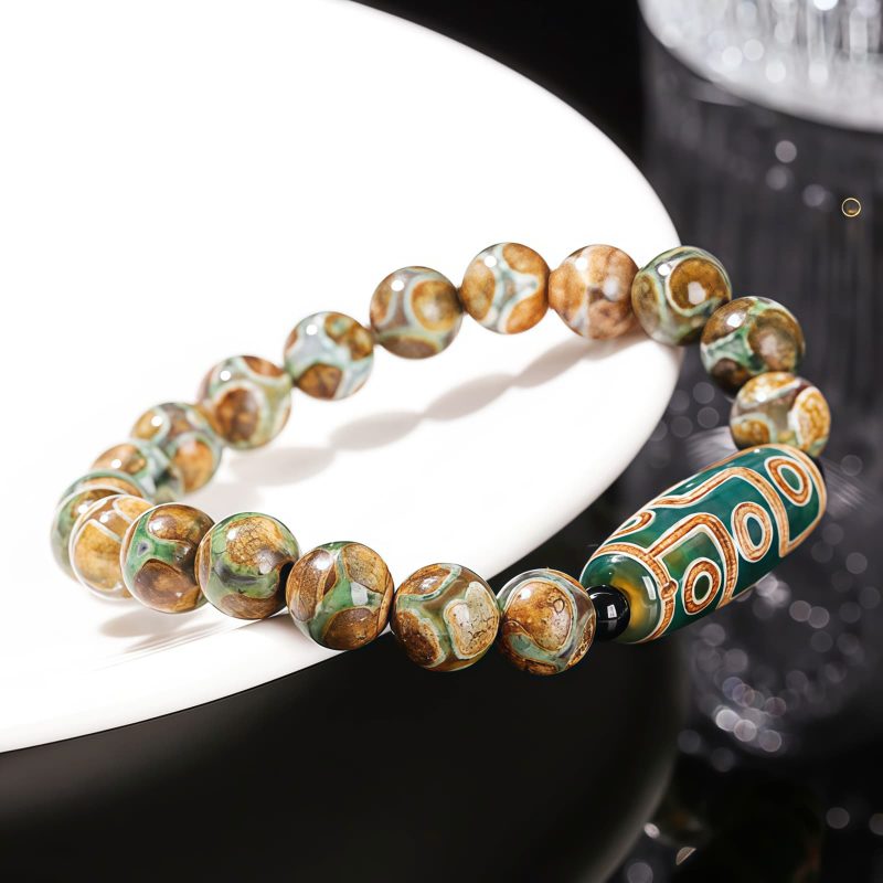 Pulsera Tibetana de Sándalo y Cuenta Dzi de Nueve Ojos para la Abundancia Tibetan Nine-Eye Dzi Bead Sandalwood Wealth Bracelet