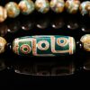 Pulsera Tibetana de Sándalo y Cuenta Dzi de Nueve Ojos para la Abundancia Tibetan Nine-Eye Dzi Bead Sandalwood Wealth Bracelet