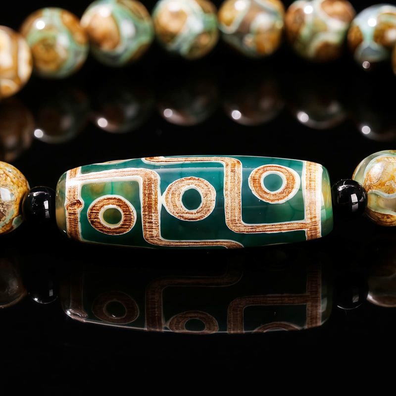 Pulsera Tibetana de Sándalo y Cuenta Dzi de Nueve Ojos para la Abundancia Tibetan Nine-Eye Dzi Bead Sandalwood Wealth Bracelet