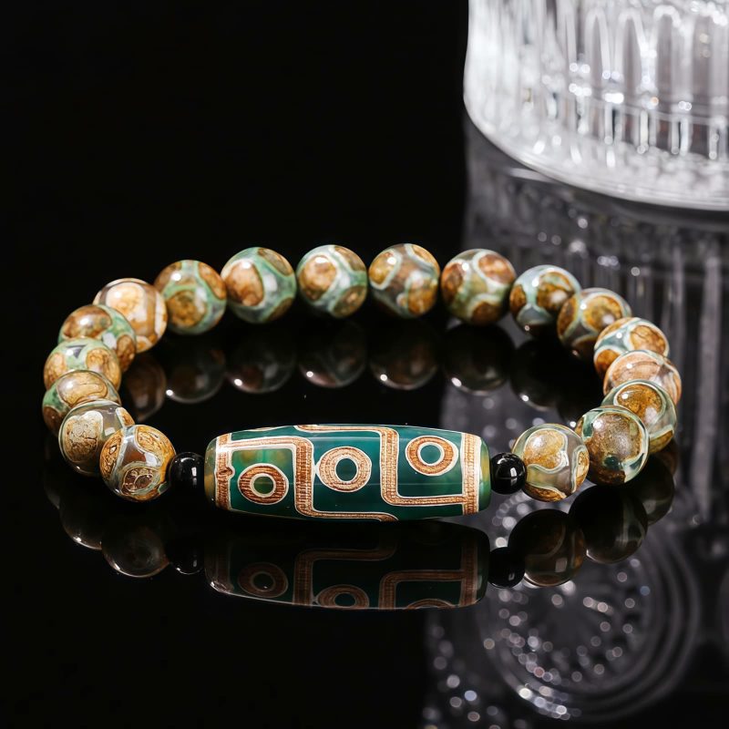 Pulsera Tibetana de Sándalo y Cuenta Dzi de Nueve Ojos para la Abundancia Tibetan Nine-Eye Dzi Bead Sandalwood Wealth Bracelet
