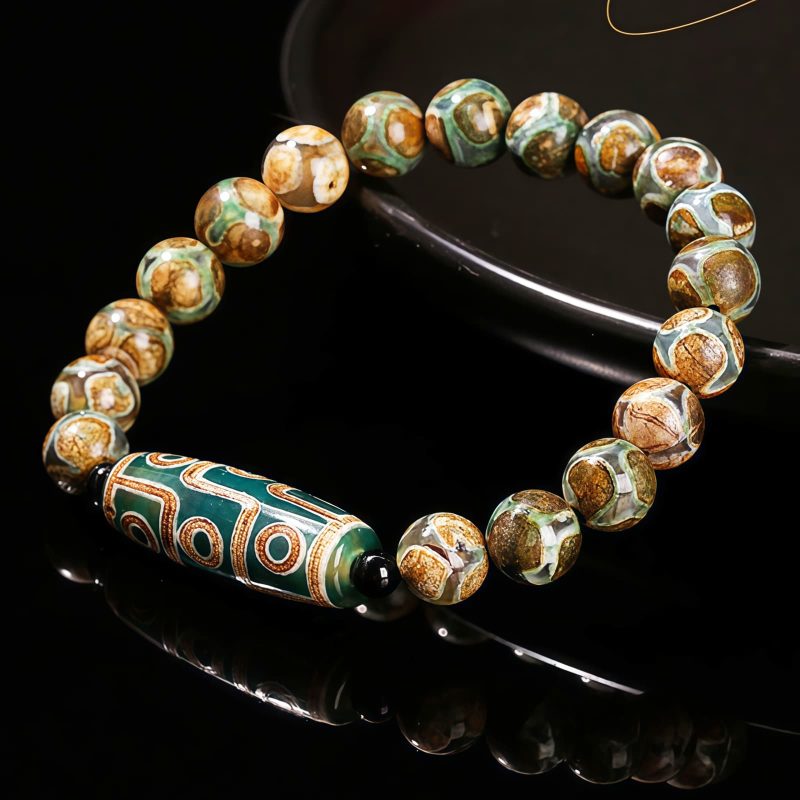 Pulsera Tibetana de Sándalo y Cuenta Dzi de Nueve Ojos para la Abundancia Tibetan Nine-Eye Dzi Bead Sandalwood Wealth Bracelet