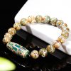 Pulsera Tibetana de Sándalo y Cuenta Dzi de Nueve Ojos para la Abundancia Tibetan Nine-Eye Dzi Bead Sandalwood Wealth Bracelet