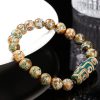 Pulsera Tibetana de Sándalo y Cuenta Dzi de Nueve Ojos para la Abundancia Tibetan Nine-Eye Dzi Bead Sandalwood Wealth Bracelet