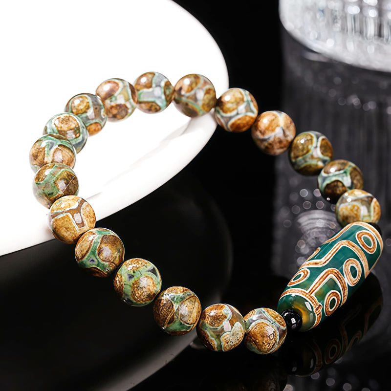 Pulsera Tibetana de Sándalo y Cuenta Dzi de Nueve Ojos para la Abundancia Tibetan Nine-Eye Dzi Bead Sandalwood Wealth Bracelet