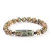 Pulsera Tibetana de Sándalo y Cuenta Dzi de Nueve Ojos para la Abundancia Tibetan Nine-Eye Dzi Bead Sandalwood Wealth Bracelet