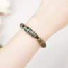Pulsera Tibetana de Sándalo y Cuenta Dzi de Nueve Ojos para la Abundancia Tibetan Nine-Eye Dzi Bead Sandalwood Wealth Bracelet