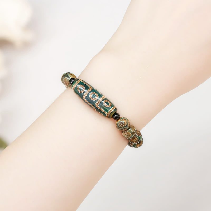 Pulsera Tibetana de Sándalo y Cuenta Dzi de Nueve Ojos para la Abundancia Tibetan Nine-Eye Dzi Bead Sandalwood Wealth Bracelet