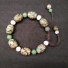 Pulsera Tibetana de Protección con Cuenta Dzi de Tres Ojos Tibetan Three-Eyed Dzi Bead Protection Bracelet