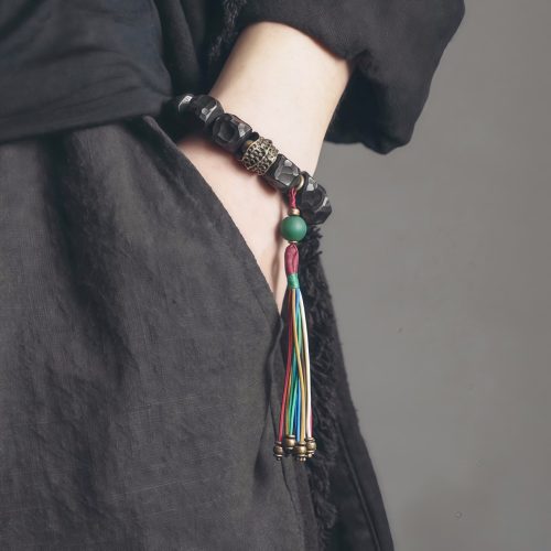 Pulsera Mala Tibetana de Ébano y Cobre para la Paz y el Equilibrio