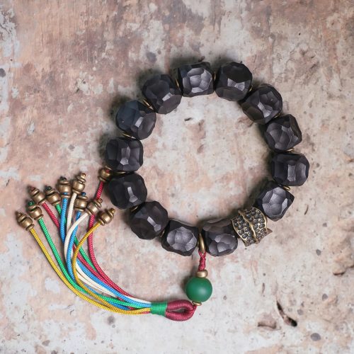 Pulsera Mala Tibetana de Ébano y Cobre para la Paz y el Equilibrio