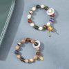 Tibetan Liuli Glass Om Mani Padme Hum Prayer Wheel Bracelet Tibetan Liuli Glass Om Mani Padme Hum Prayer Wheel Bracelet
