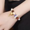 Tibetan Liuli Glass Om Mani Padme Hum Prayer Wheel Bracelet Tibetan Liuli Glass Om Mani Padme Hum Prayer Wheel Bracelet