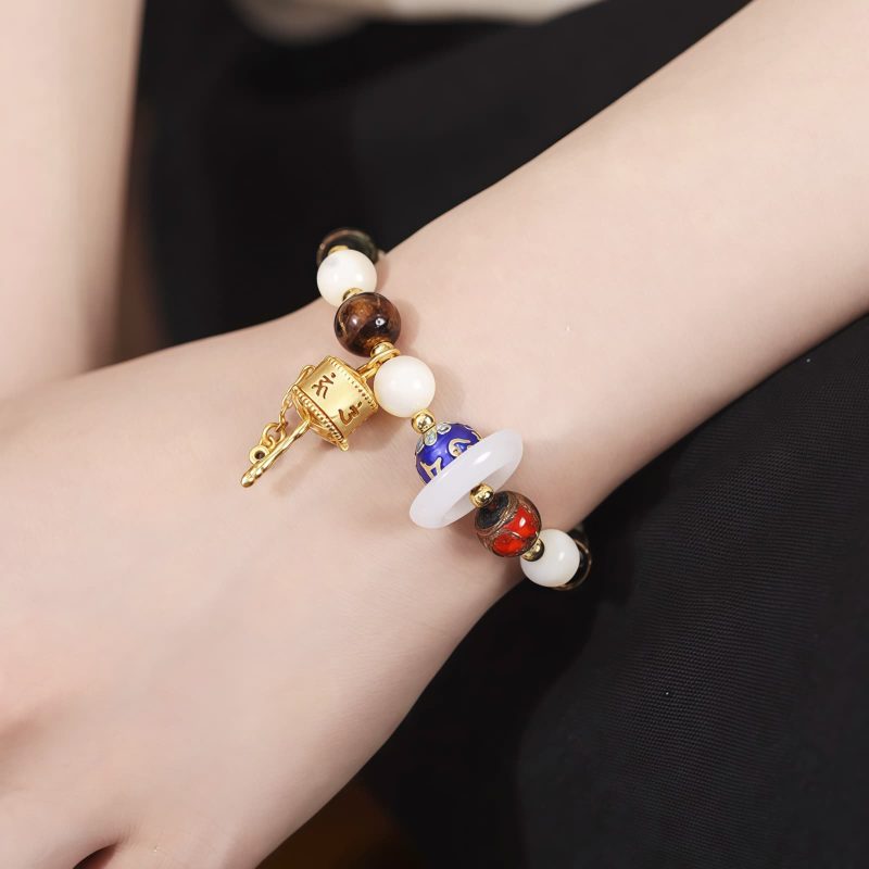 Tibetan Liuli Glass Om Mani Padme Hum Prayer Wheel Bracelet Tibetan Liuli Glass Om Mani Padme Hum Prayer Wheel Bracelet