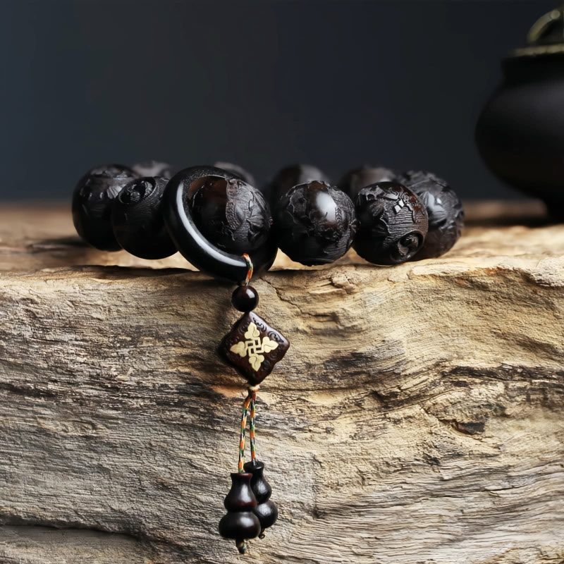 Ebony Wood Yin Yang Engraved Gourd Balance Bracelet Ebony Wood Yin Yang Engraved Gourd Balance Bracelet