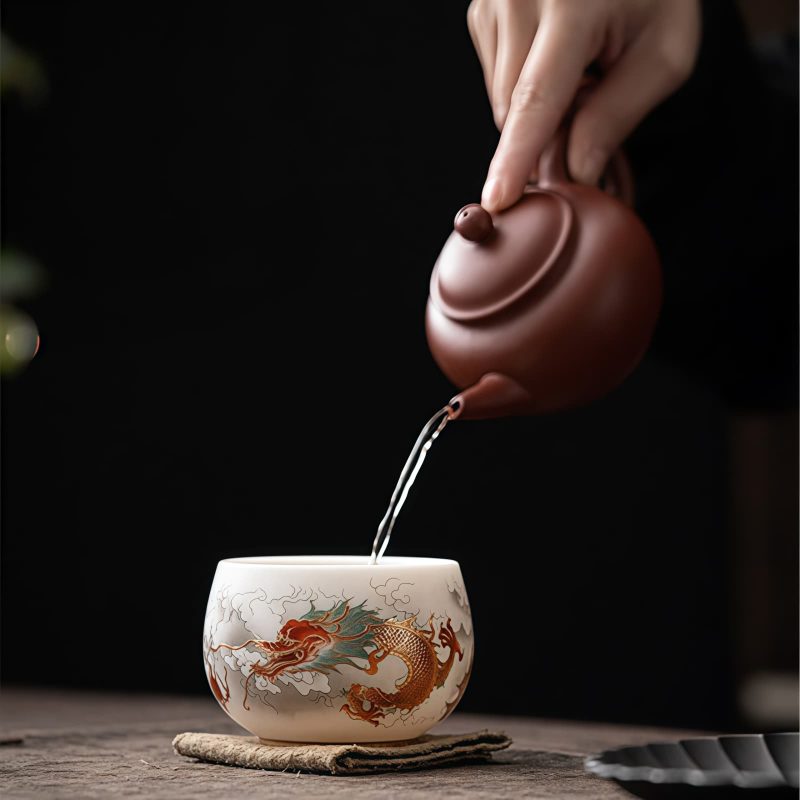 Chinese Ceramic Koi Fish Teacup with Phoenix Dragon Design Chinese Ceramic Koi Fish Teacup with Phoenix Dragon Design