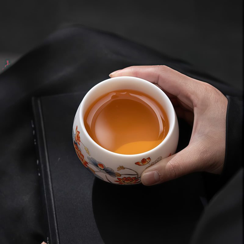 Chinese Ceramic Koi Fish Teacup with Phoenix Dragon Design Chinese Ceramic Koi Fish Teacup with Phoenix Dragon Design