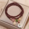 Natural Garnet Quartz Koi Fish Triple Wrap Bracelet Natural Garnet Quartz Koi Fish Triple Wrap Bracelet