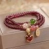 Natural Garnet Quartz Koi Fish Triple Wrap Bracelet Natural Garnet Quartz Koi Fish Triple Wrap Bracelet