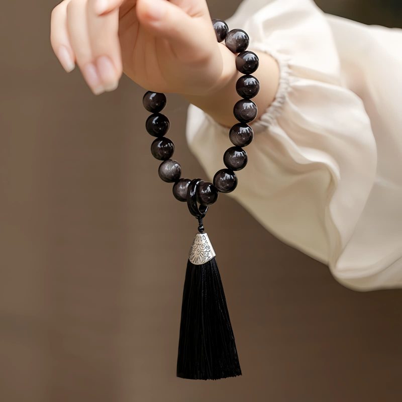 Natural Silver Sheen Obsidian Lion Wrist Mala Natural Silver Sheen Obsidian Lion Wrist Mala