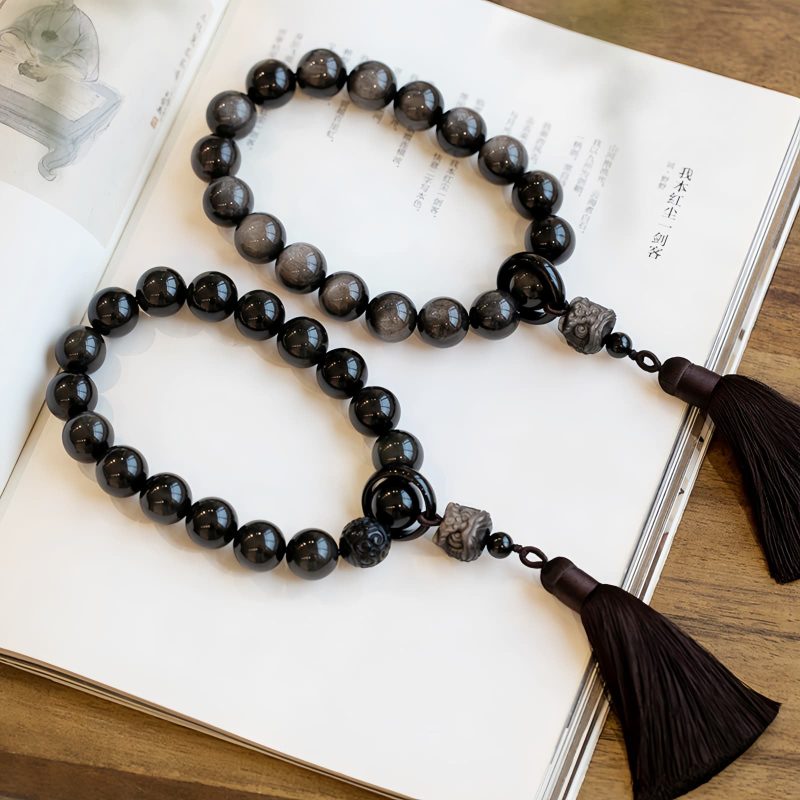 Natural Silver Sheen Obsidian Lion Wrist Mala Natural Silver Sheen Obsidian Lion Wrist Mala