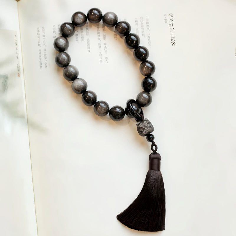 Natural Silver Sheen Obsidian Lion Wrist Mala Natural Silver Sheen Obsidian Lion Wrist Mala