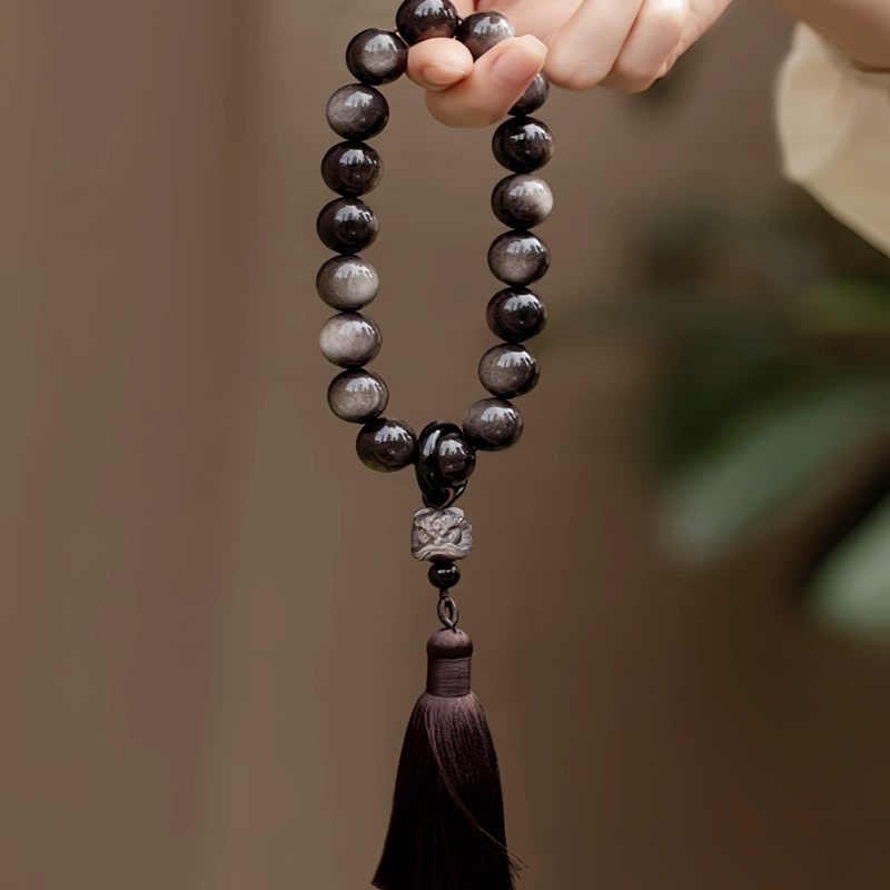 Natural Silver Sheen Obsidian Lion Wrist Mala Natural Silver Sheen Obsidian Lion Wrist Mala