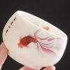 White Ceramic Koi Fish Teacup White Ceramic Koi Fish Teacup