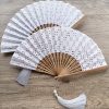 Embroidered Cotton Folding Fan with Bamboo Handle Embroidered Cotton Folding Fan with Bamboo Handle