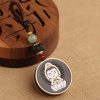 Ebony Wood Avalokitesvara Keychain with Om Mani Padme Hum Ebony Wood Avalokitesvara Keychain with Om Mani Padme Hum