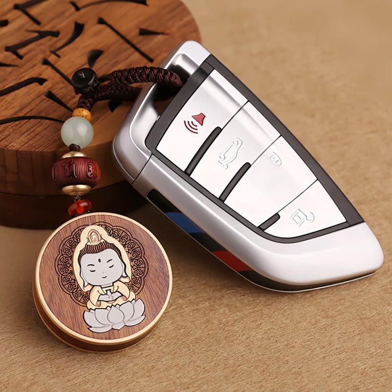 Ebony Wood Avalokitesvara Keychain with Om Mani Padme Hum Ebony Wood Avalokitesvara Keychain with Om Mani Padme Hum