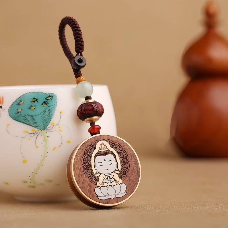 Ebony Wood Avalokitesvara Keychain with Om Mani Padme Hum Ebony Wood Avalokitesvara Keychain with Om Mani Padme Hum