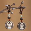 Ebony Wood Avalokitesvara Keychain with Om Mani Padme Hum Ebony Wood Avalokitesvara Keychain with Om Mani Padme Hum